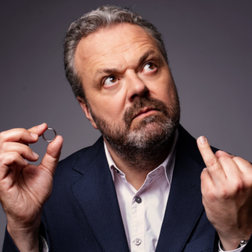 a photo of Hal Cruttenden holding a wedding ring